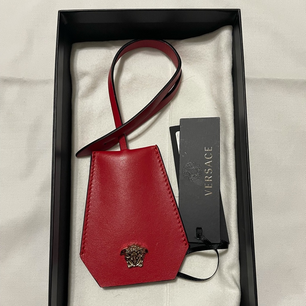 SOLD Authentic Versace bag charm with key ring